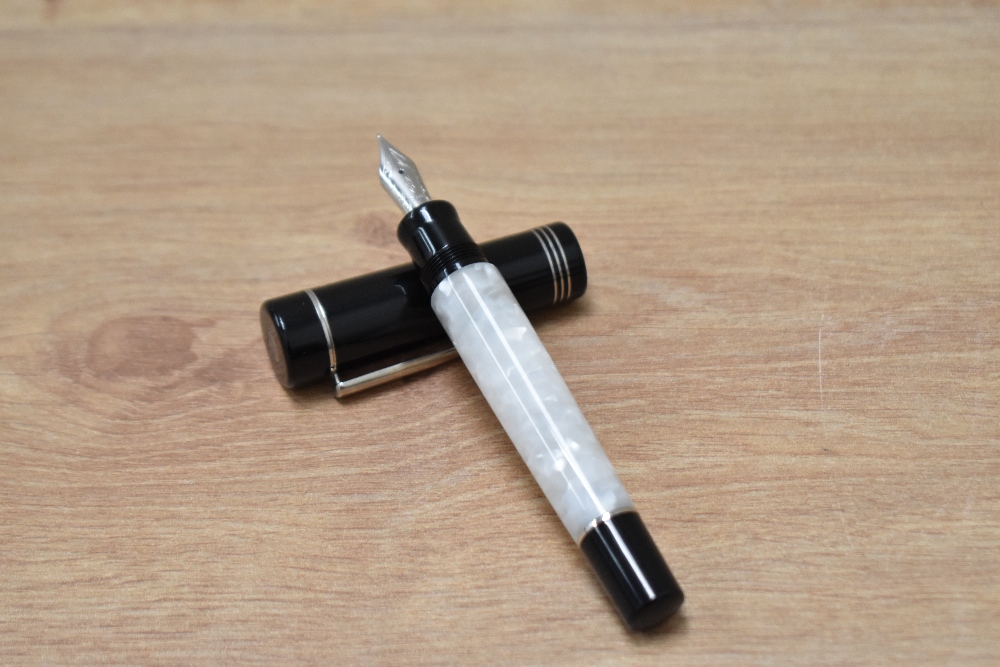 A boxed Delta Scrignor converter fill fountain pen in white marble with black cap having three - Image 2 of 3