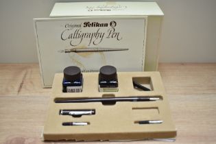A boxed Pelikan MC110 calligraphy set with 1.0, 1.5, and 2.0 steel nibs complete with calligraphy