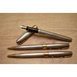 A boxed Parker Sonnet Fougere converter fill fountain pen, ballpoint pen and propelling pencil set