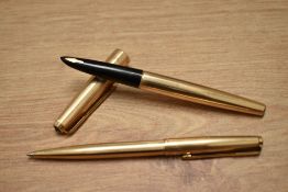 A boxed Parker 61 Insignia capillary fill fountain pen and ballpoint pen set in rolled gold.