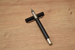 A Parker Vector cartridge fill fountain pen in black having Parker nib having five cartridges and