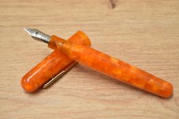 A Conklin All American converter fill fountain pen in sunburst orange having Conklin Toledo USA