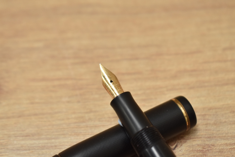 A Conway Stewart Universal lever fill fountain pen in BHR having Conway Stewart 14ct gold nib. - Image 2 of 3