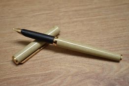 A boxed Parker 95 aerometric fill fountain pen in cream lacque with gold trim having Parker plated
