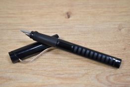 A Schneider base convertor fill fountain pen in black with chrome clip