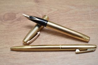 A boxed Sheaffer Imperial 727 converter fill gold fill fountain and ballpoint pen set having