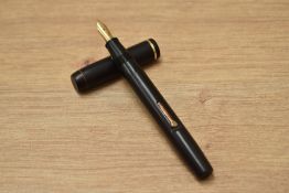 A Conway Stewart 45 lever fill fountain pen in BHR having Conway Stewart 14ct Gold nib. Barrel