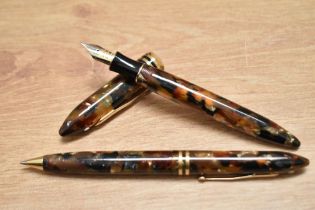 A boxed Sheaffer Balance II converter fill fountain pen and ballpoint pen set in amber glow with two