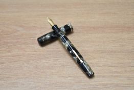 A Mentmore Auto Flow lever fill fountain pen grey black marble with a narrow band to the cap