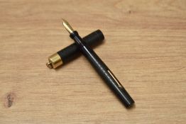A Moore L-72 lever fill fountain pen in chased black BHR with ring top having the Moore pen No.2
