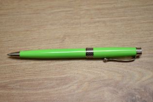 A Montegrappa Piacere ballpoint pen in lime green, new, boxed with papers.