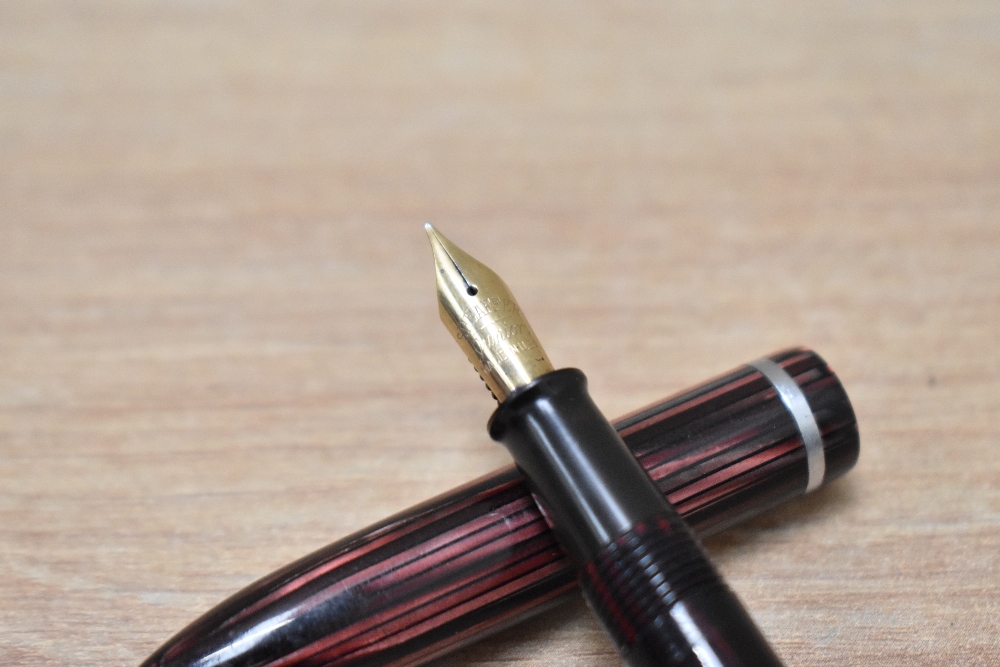 A Sheaffer Lifetime Balance junior plunger fill fountain pen in burgundy striated with single band - Image 2 of 3