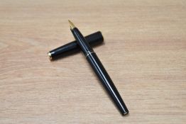 A Montblanc 221 cartridge/ convertor fill fountain pen in black having broad gold nib