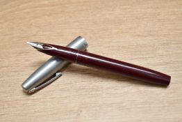 A boxed Sheaffer Triumph Imperial converter fill fountain pen in burgundy with brushed steel cap