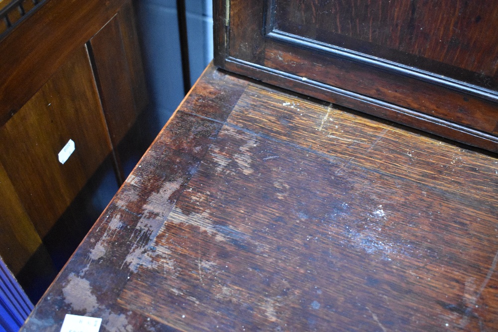 A period oak dresser having delft rack with shelves and cupboards to side , drawers to base on - Image 4 of 7