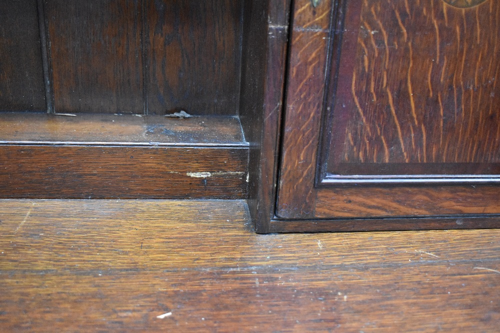 A period oak dresser having delft rack with shelves and cupboards to side , drawers to base on - Image 3 of 7