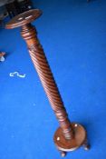 A 19th Century mahogany torchere, height approx. 123cm