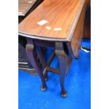 A early 20th Century mahogany oval top gateleg dining table