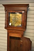 An oak and mahogany longcase clock having 18th Century 30 hour movement with brass dial named with