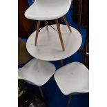 A modern small circular dining table and three similar chairs, in white , diameter approx 80cm