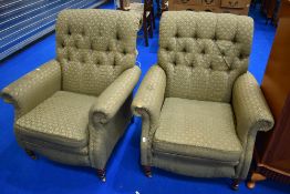 A pair of modern button back easy chairs, labelled Greensmith, as found
