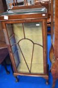 An early to mid 20th Century walnut china cabinet
