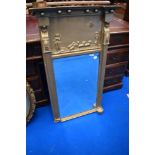 A traditional plaster gilt frame wall mirror with shepherd/shepherdess decoration (loose pieces