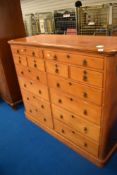 A Victorian Aesthetic style stained pine chest of drawers, possibly merchants or tailors , approx