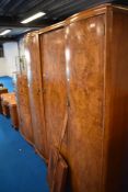 An early to mid 20th Century walnut bedroom suite, Waring & Gillow
