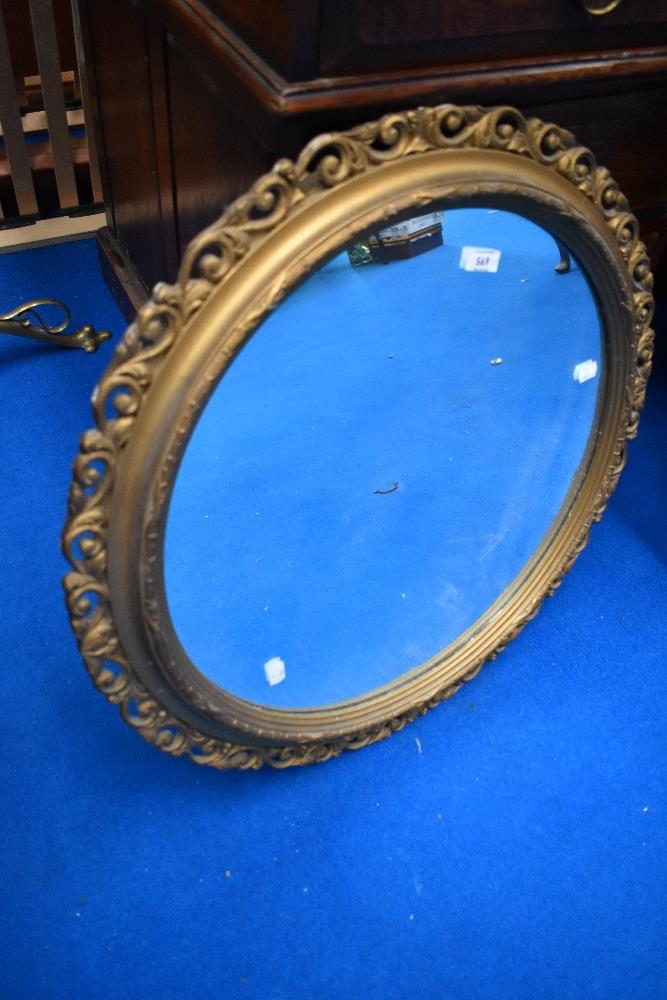 A traditional gilt frame wall mirror of circular form, diameter approx. 65cm