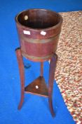 A vintage plant stand with barrel style top, height approx. 92cm