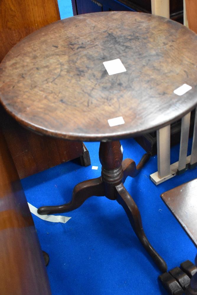 A 19th Century oak pedestal table having circular top, diameter approx 51cm