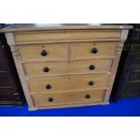 A Victorian stripped pine chest of two over three drawers, approx W125 H117cm