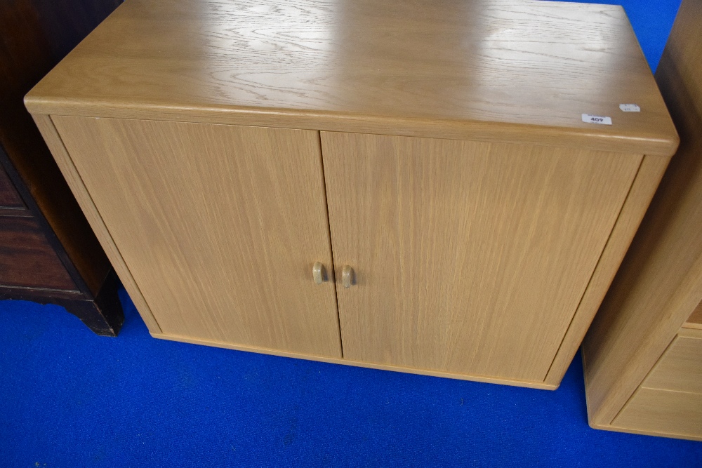 A nice quality modern beech effect low cupboard and arch top display, labelled Holtkamp - Image 2 of 4