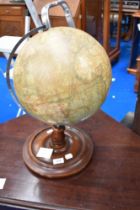 A vintage globe on stand , height approx. 45cm
