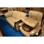 A Stressless lounge suite comprising settee, two armchairs and a footstool, in beige