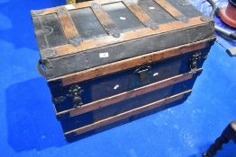 A traditional travel trunk having lined interior, dimensions approx 81 x 51 x 61cm