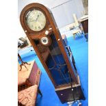 A 1930s oak longcase clock wth chrome applique numerals and barometric dial, height approx. 191cm