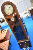 A 1930s oak longcase clock wth chrome applique numerals and barometric dial, height approx. 191cm
