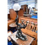 A reproduction bronze effect table lamp, modelled as exotic dancers