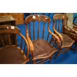 Three early 20th Century oak office chairs
