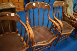 Three early 20th Century oak office chairs
