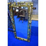 A modern designer gilt frame wall mirror, approx 107 x 48cm