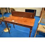A Victorian mahogany wash stand or side table having panel back, approx 118 x 51cm