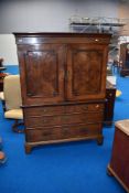 A 19th Century walnut and mahogany linen press having drawer base, width approx 127cm