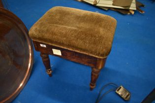 A Victorian mahogany dressing table or piano stool having turned legs