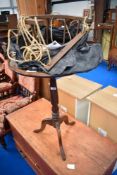 A 19th Century tripod table and childs swing seat