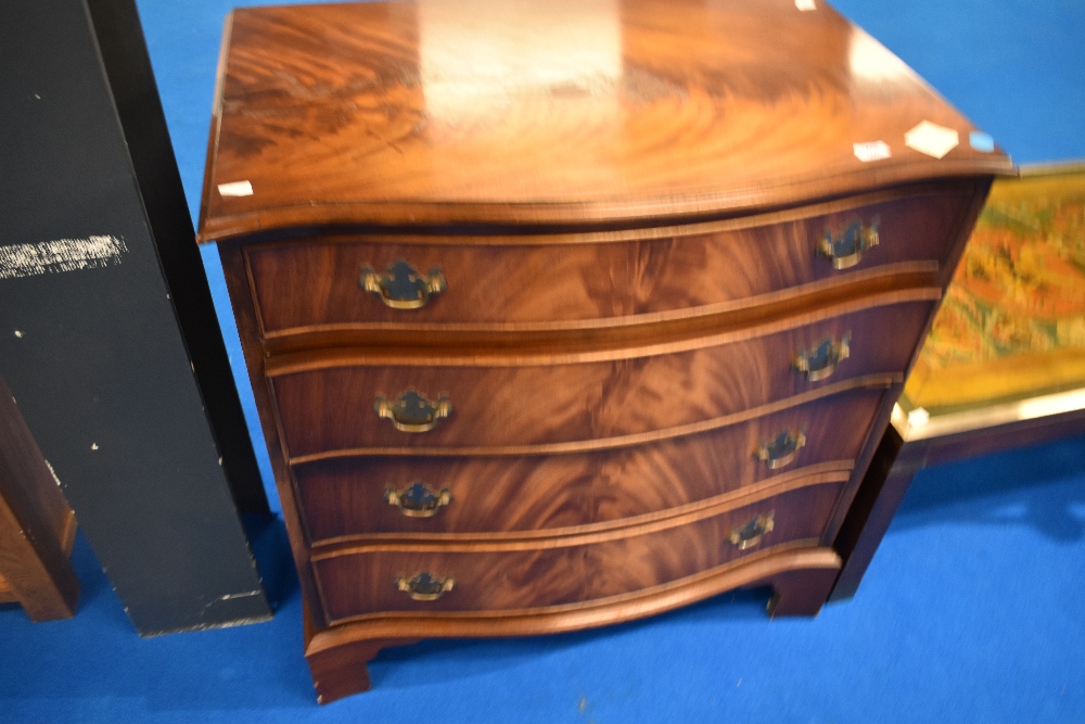 A reproduction Regency serpentine front chest of four drawers, width approx 78cm