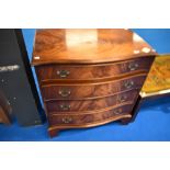 A reproduction Regency serpentine front chest of four drawers, width approx 78cm