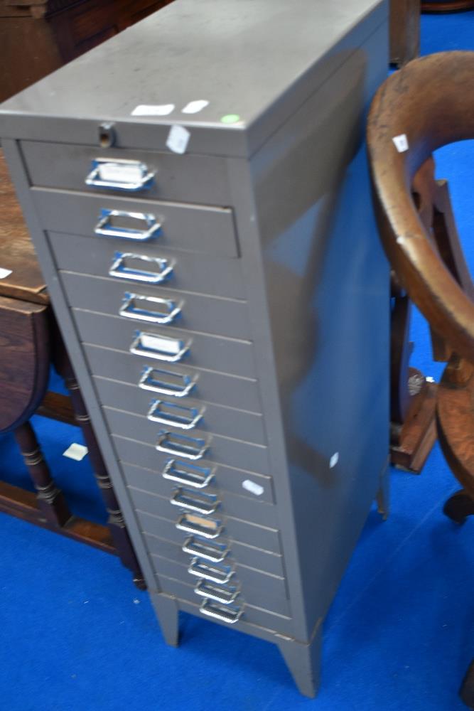 A vintage document multi drawer filing cabinet